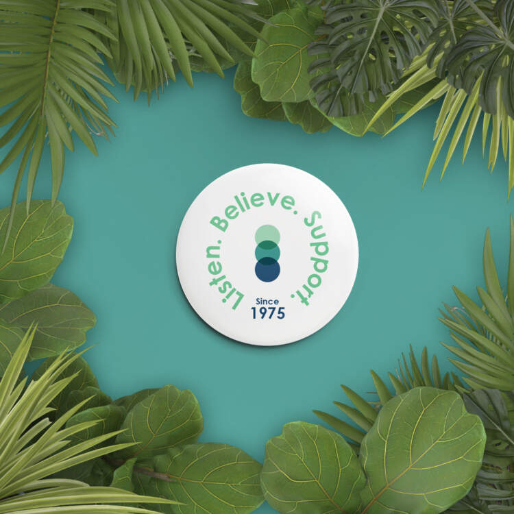 A white button sits on a teal background surrounded by leafy plants: who we are is illustrated by the tagline "Listen. Believe. Support.", "since 1975", and our 3 circles overlapping agency icon.