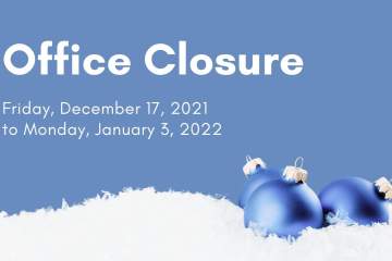 Light Blue Christmas Ornaments On Snow With A Blue Background. White Text That Reads: Winter Office Closure Friday, December 17, 2021 To Monday, January 3, 2022