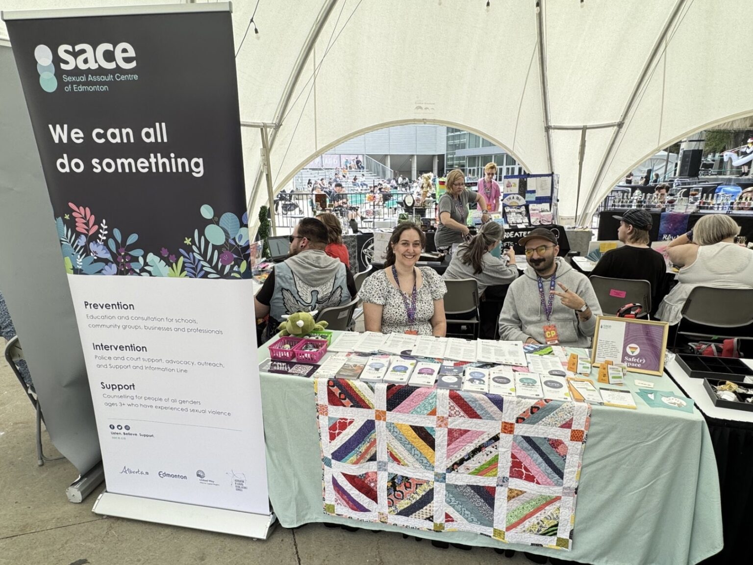 Soroush and Volunteer at Pride Market at K Days 2 - What We Do 2025-2026