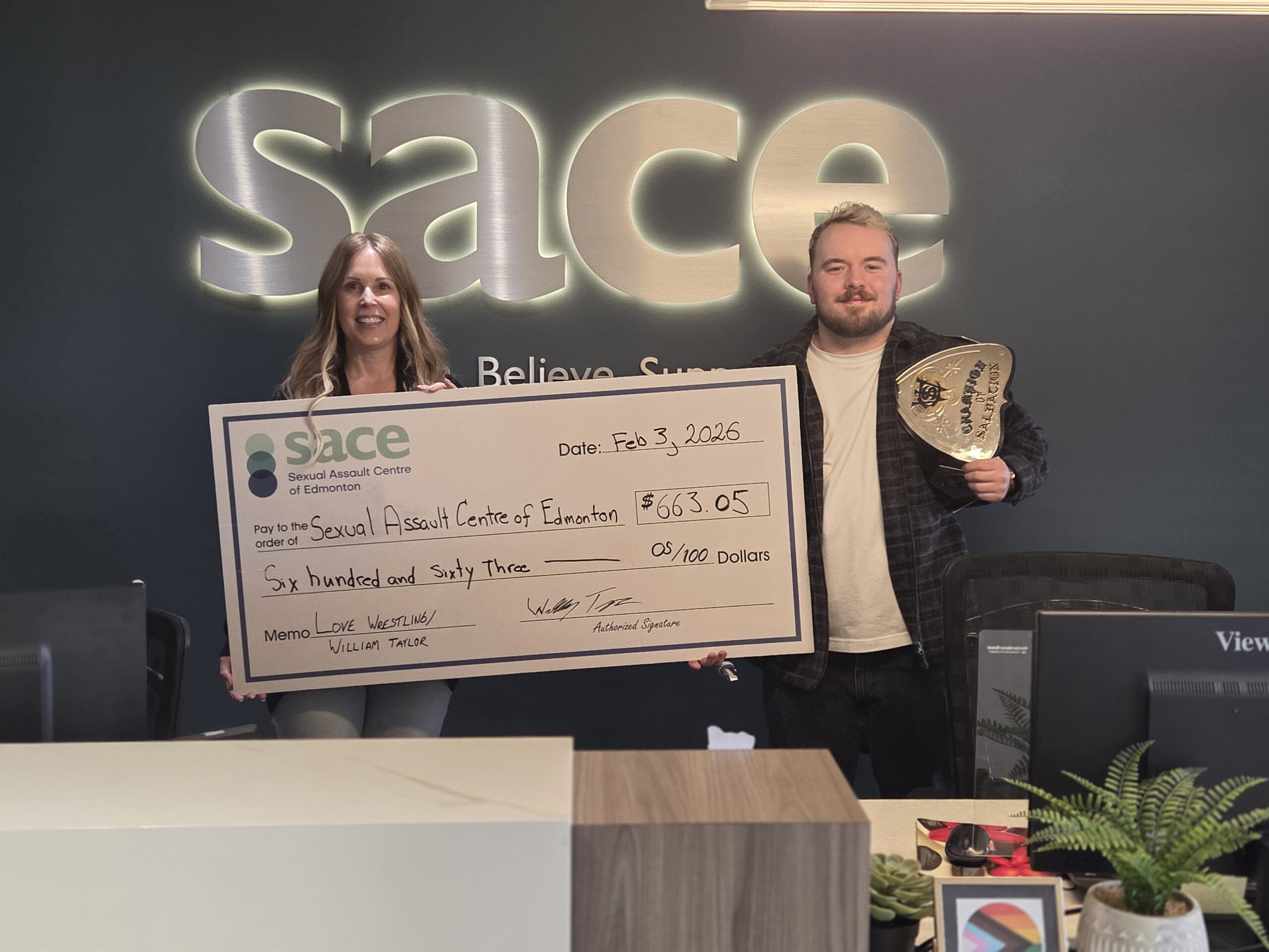 Love Wresting Cheque Presentation 02.03.26 scaled - How We're Making a Difference 2025-2026